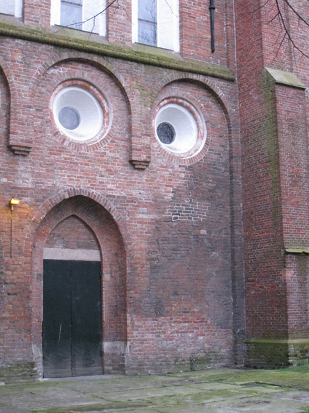 a face in a church porch