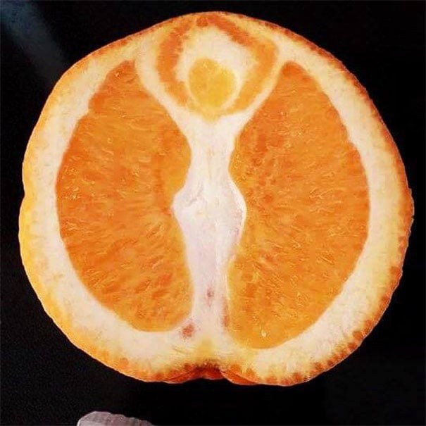 a woman's silhouette inside an orange
